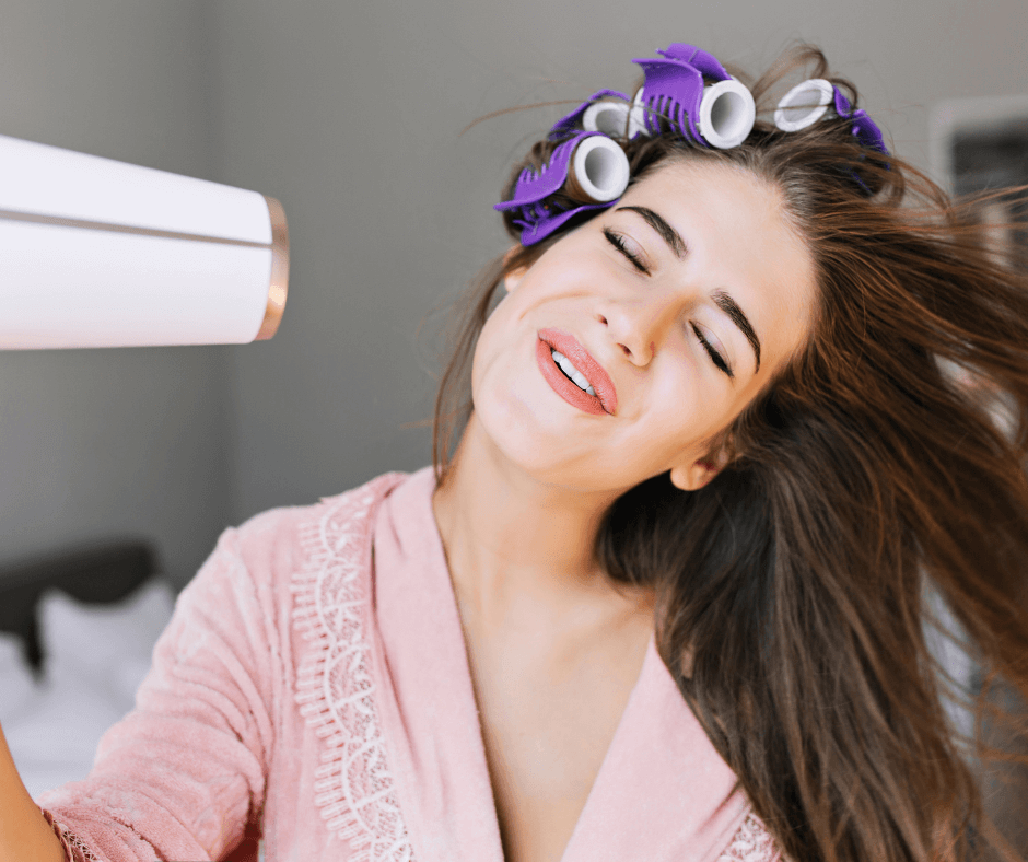 portrait-pretty-housewife-pink-bathrobe-with-curler-home-she-looks-enjoyed-drying-hair