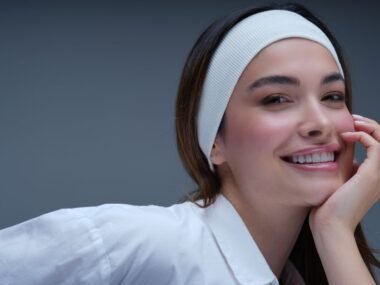 Woman with fresh, natural, glowing skin and a light tinted-moisturizer finish