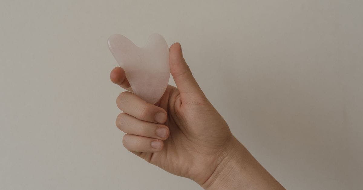 Gua sha facial massage tool