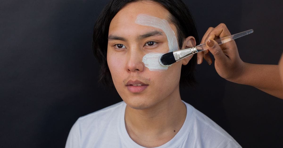 Applying Korean skincare products
