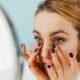 Woman applying BB cream for natural, even, glowing skin