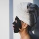 Face sheet mask on model, glowing skincare treatment