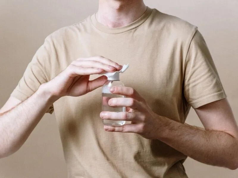Micellar water and cotton pad for gentle no-rinse makeup removal