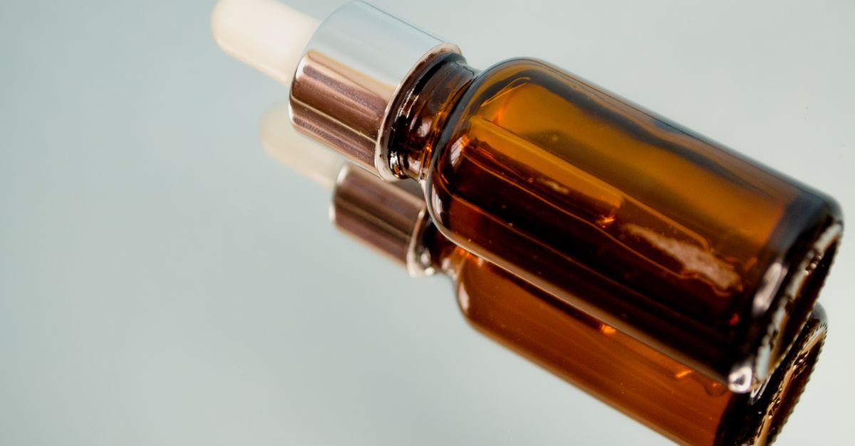 A niacinamide serum in an amber glass dropper bottle