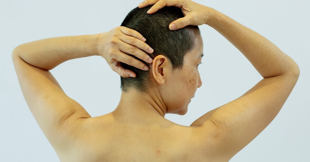 A woman’s shoulder and upper back
