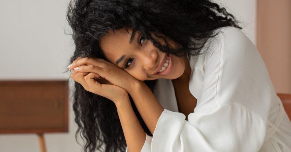 Smiling woman with glossy dark hair