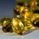 Golden vitamin E capsules in close-up