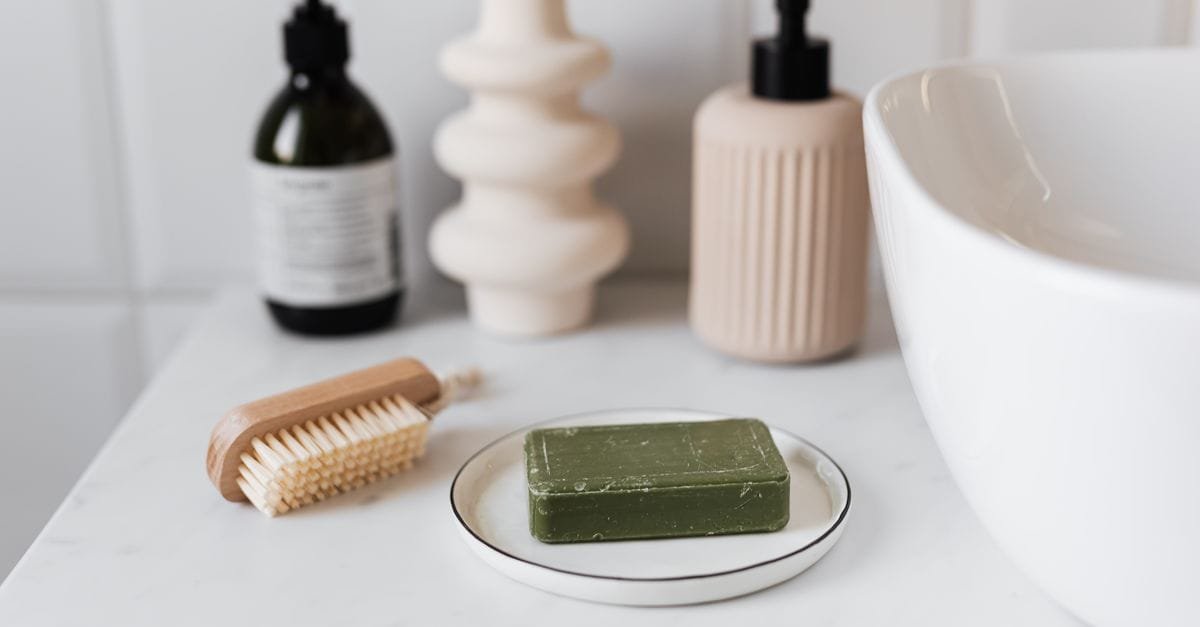 Minimal soap and ceramics by a bathroom sink
