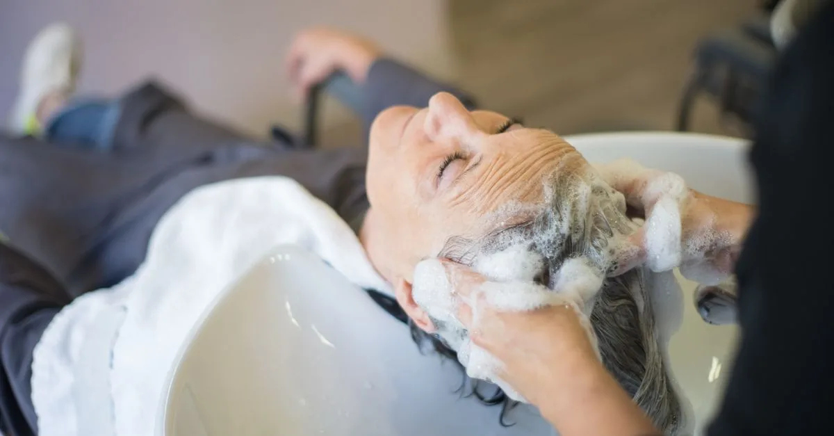 A scalp massage at a salon basin